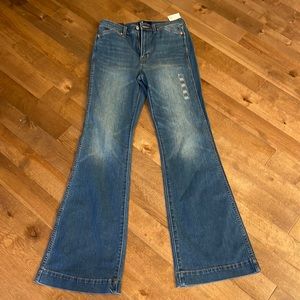Women’s Gap flare jeans. New. Medium wash and high waisted. Size 27.